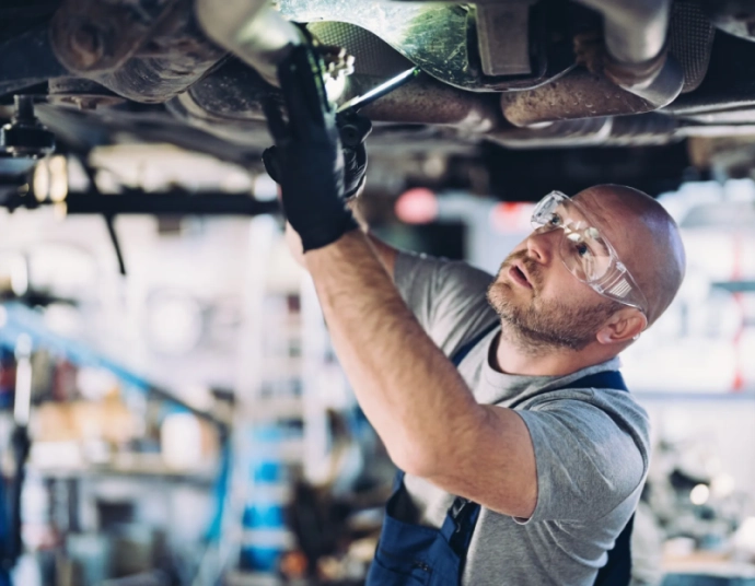 Quality engineer reviewing translated PPAP documentation at an automotive supplier plant