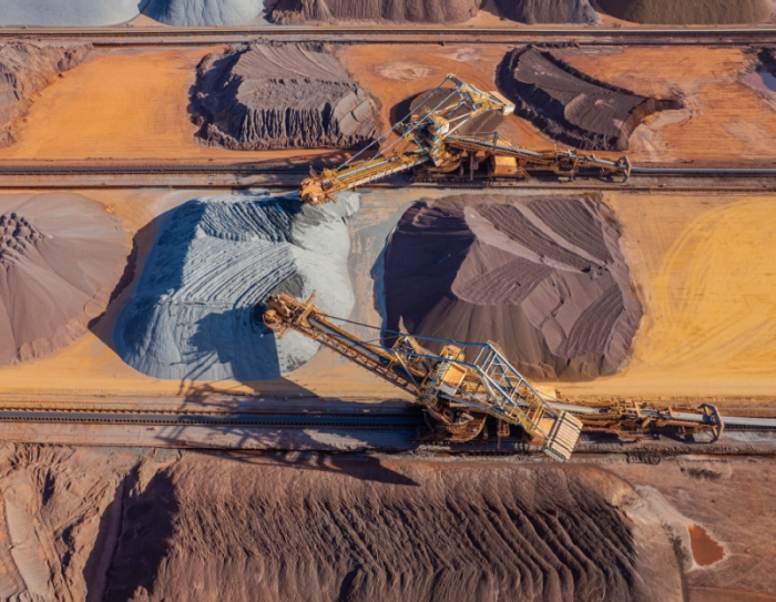Haul truck loading ore at an open pit mine