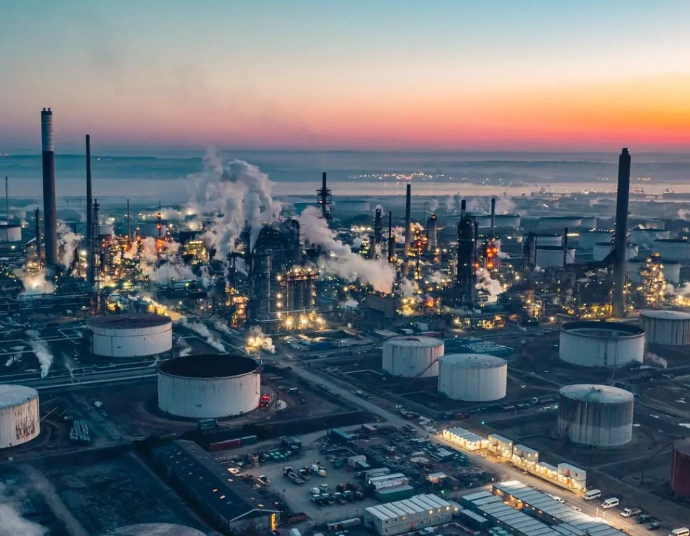 Stack of bilingual safety data sheets at a Gulf Coast refinery